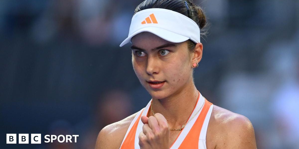 Iva Jovic clenches her fist in celebration at the Australian Open
