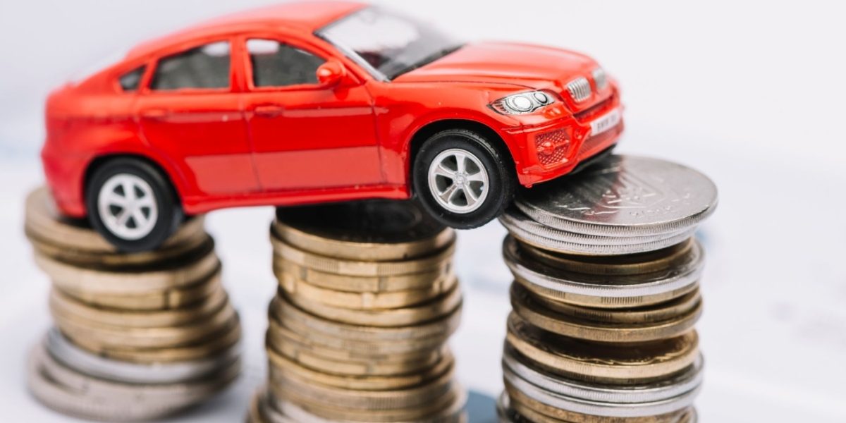 car-insurance_small-red-car-stack-increasing-coins_photo-from-freepik.jpg - ReactMedia