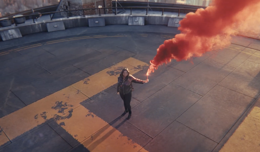 Octavia Spencer standing on a roof with a smoke flare